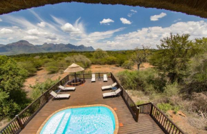 Отель Stunning Mountain Views From A 3-Bedroom Home With Pool  Hoedspruit